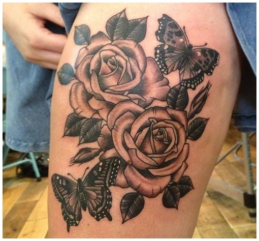 Beautiful rose butterfly tattoo on thigh