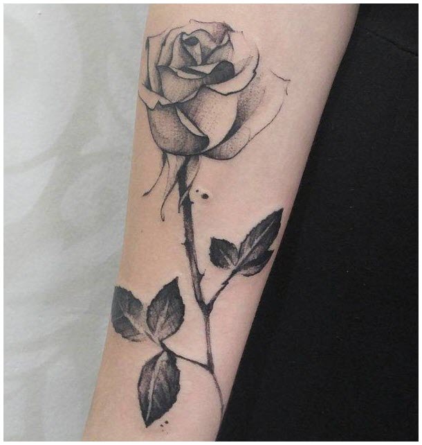 Beautiful black and white rose tattoo