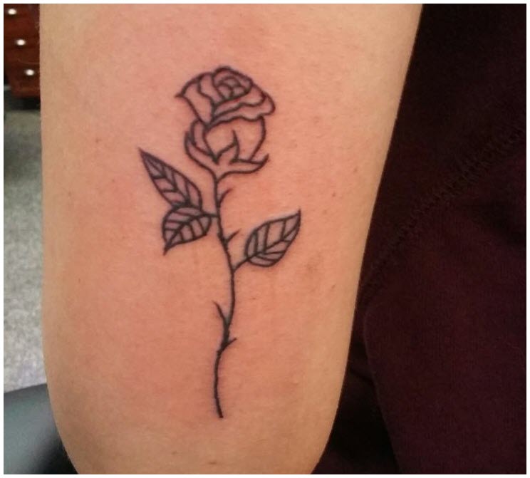 Beautiful simple rose tattoo