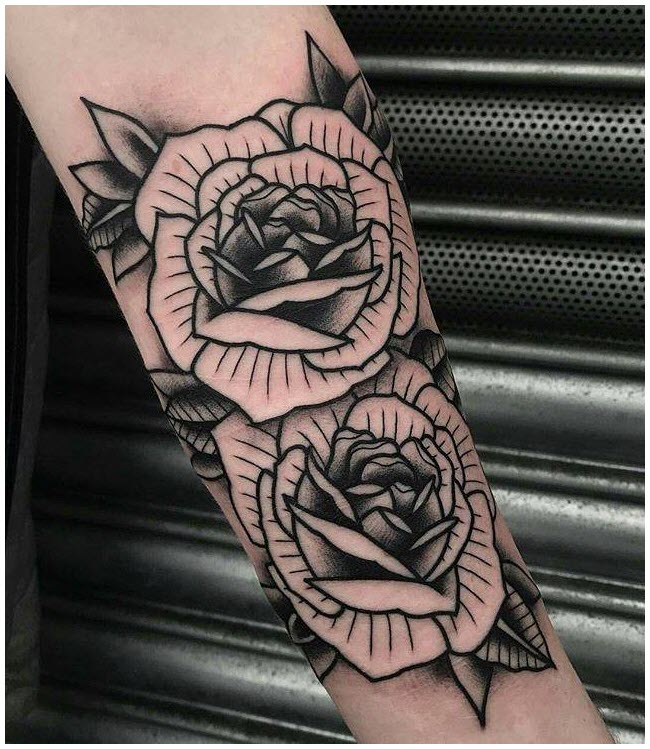 Beautiful rose tattoo on arm