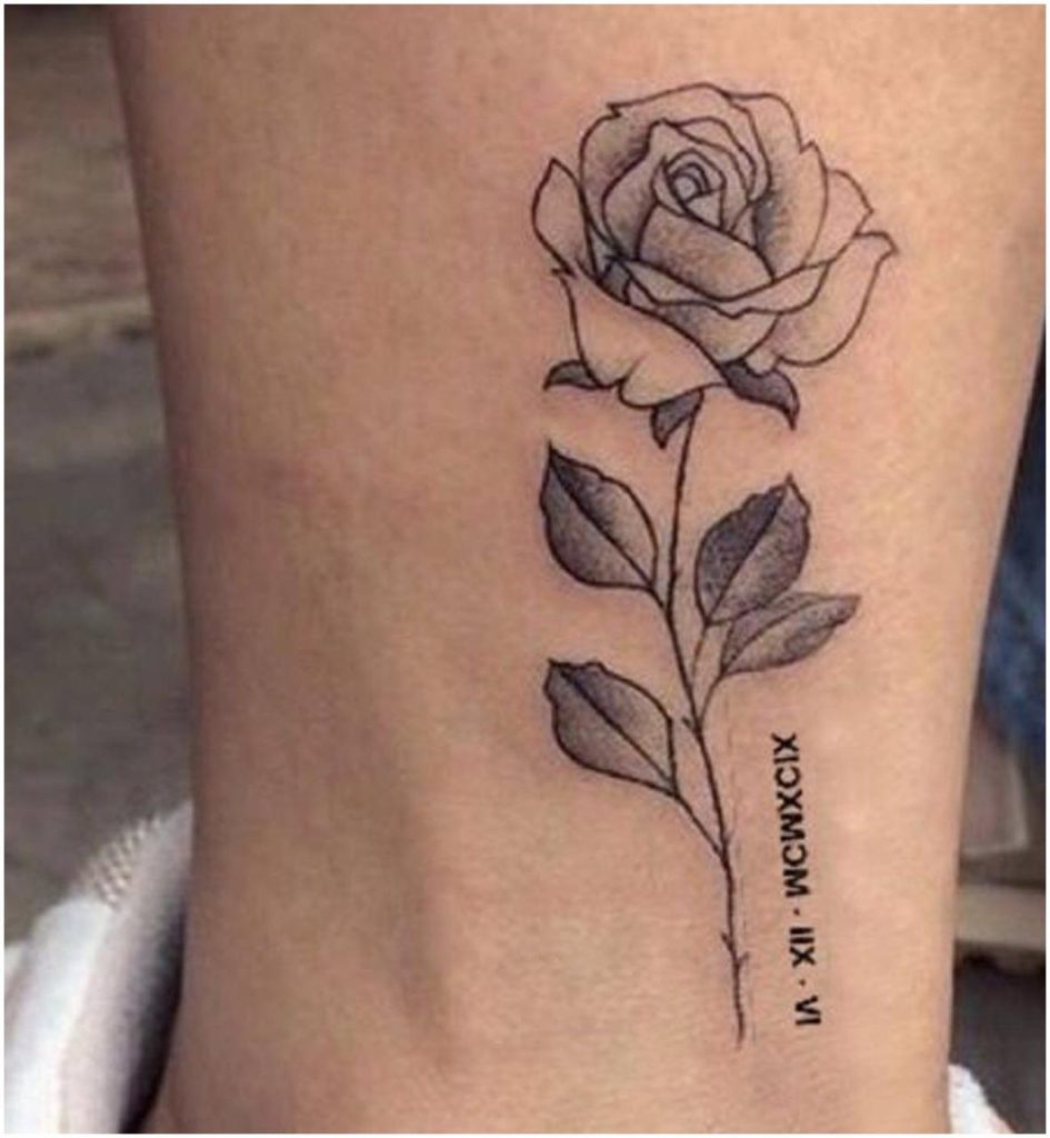 Rose tattoo on leg