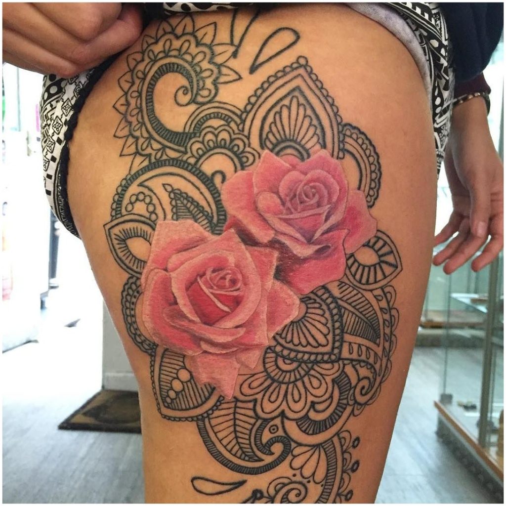 Photo of rose tattoo pattern on thigh