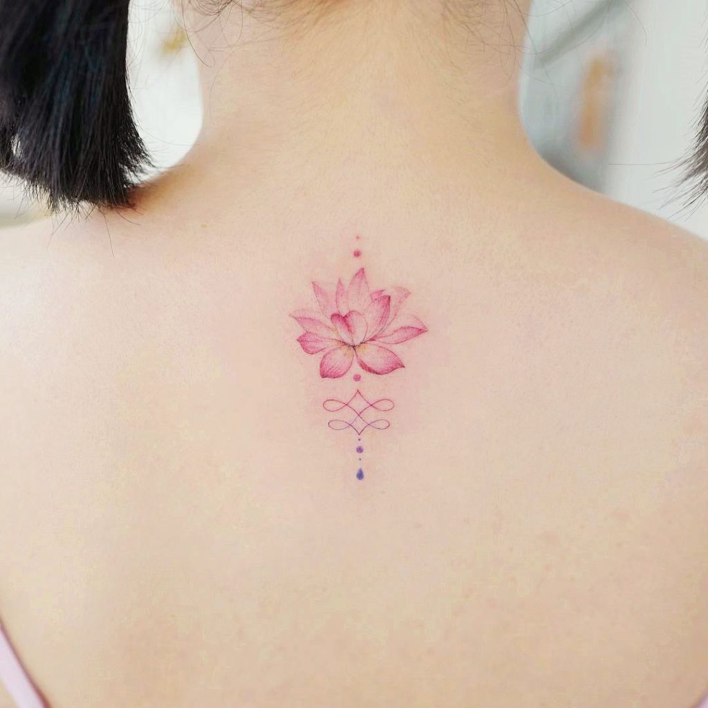 Lovely mini lotus tattoo