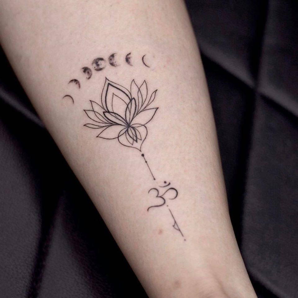 Unique mini lotus tattoo