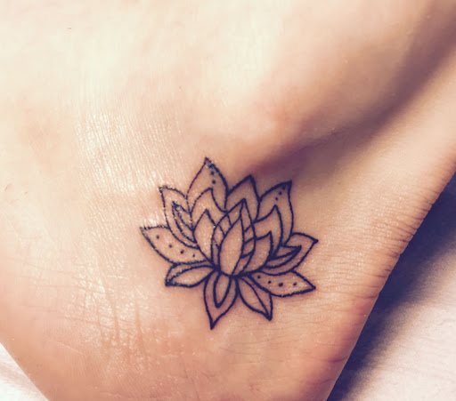 Cool mini lotus tattoo